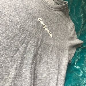 Brandy Melville Tops - Brandy Melville California Tee Brandy Melville Tops - Brandy Melville California Tee